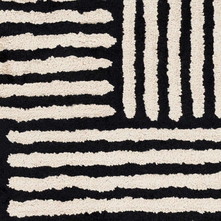 Chittering Modern Style Black And Ivory Hand Tufted Area Rug - The Rug Decor