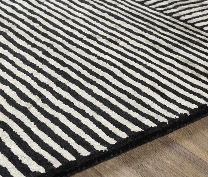 Chittering Modern Style Black And Ivory Hand Tufted Area Rug - The Rug Decor