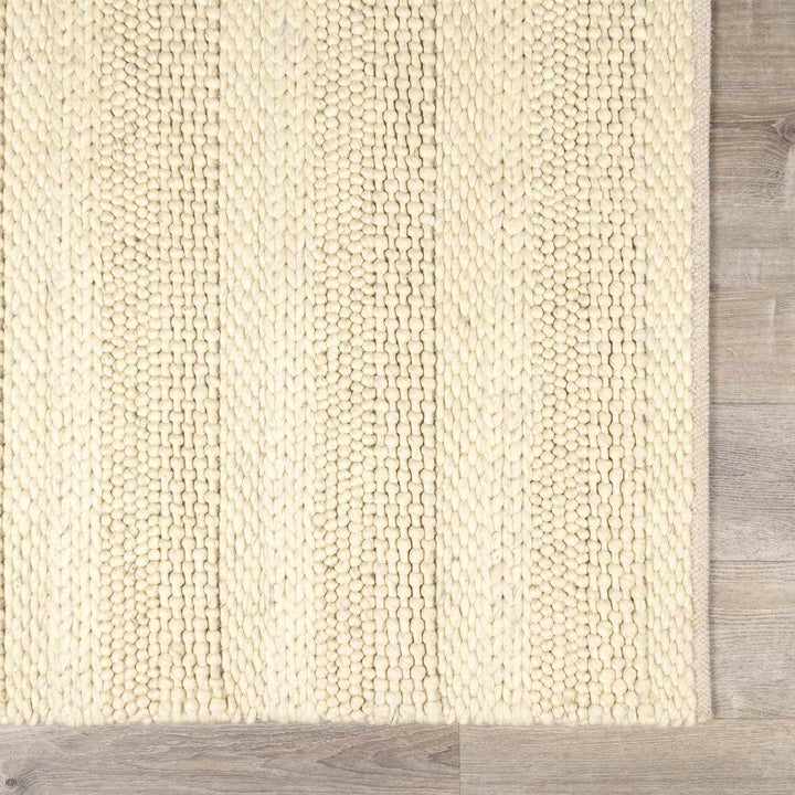 Clarke Modern Solid Design Beige Hand Woven Wool Area Rug - The Rug Decor