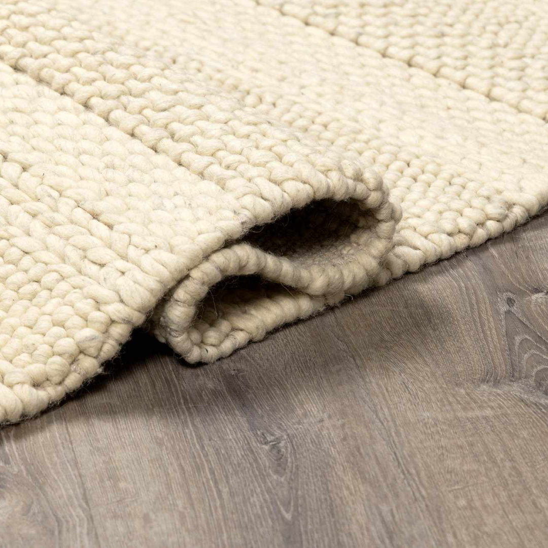 Clarke Modern Solid Design Beige Hand Woven Wool Area Rug - The Rug Decor