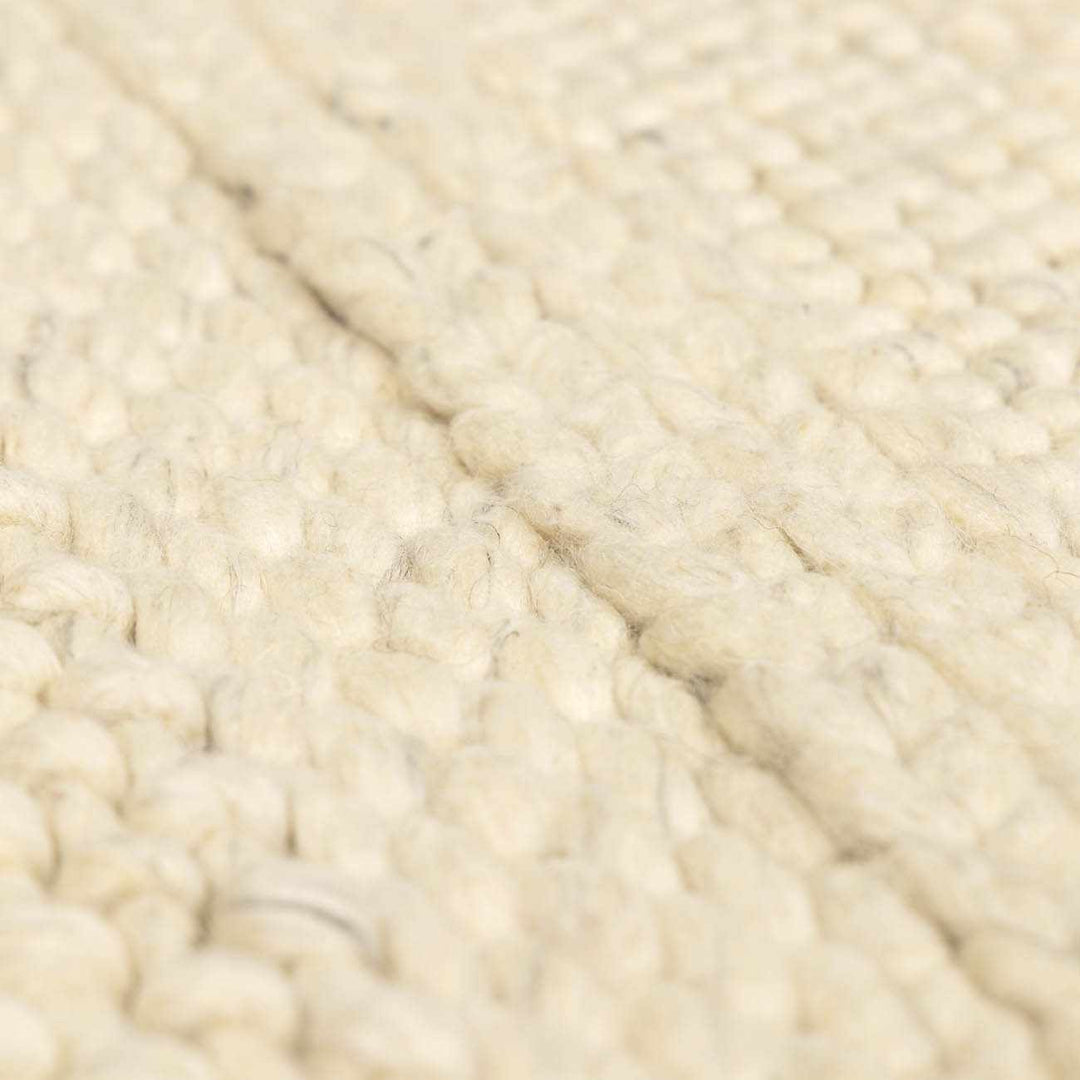 Clarke Modern Solid Design Beige Hand Woven Wool Area Rug - The Rug Decor