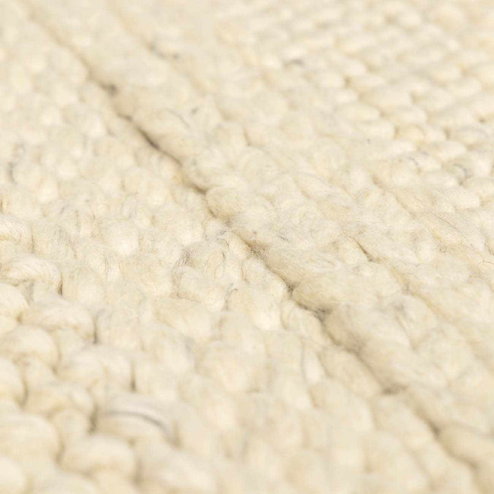 Clarke Modern Solid Design Beige Hand Woven Wool Area Rug - The Rug Decor