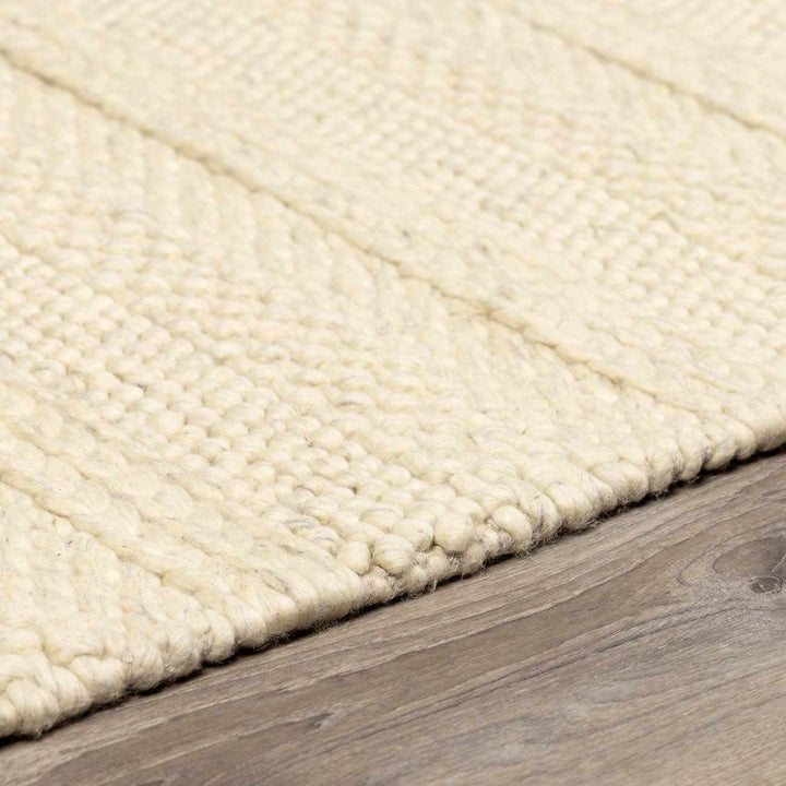Clarke Modern Solid Design Beige Hand Woven Wool Area Rug - The Rug Decor