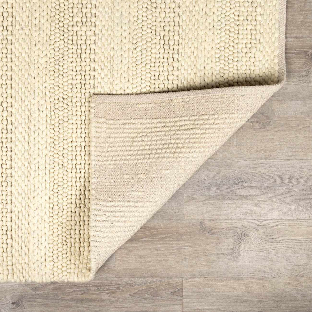Clarke Modern Solid Design Beige Hand Woven Wool Area Rug - The Rug Decor