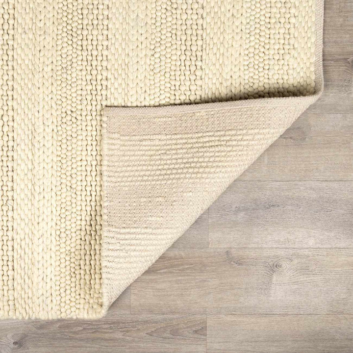 Clarke Modern Solid Design Beige Hand Woven Wool Area Rug - The Rug Decor