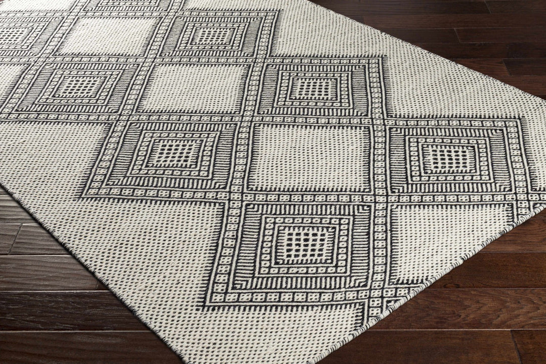 Claveria Modern Geometrical Ivory And Black Hand Woven Area Rug - The Rug Decor
