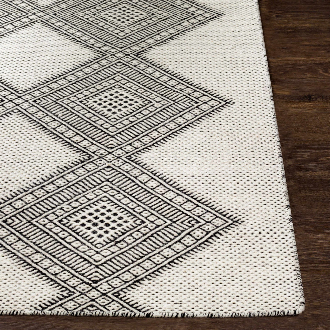 Claveria Modern Geometrical Ivory And Black Hand Woven Area Rug - The Rug Decor