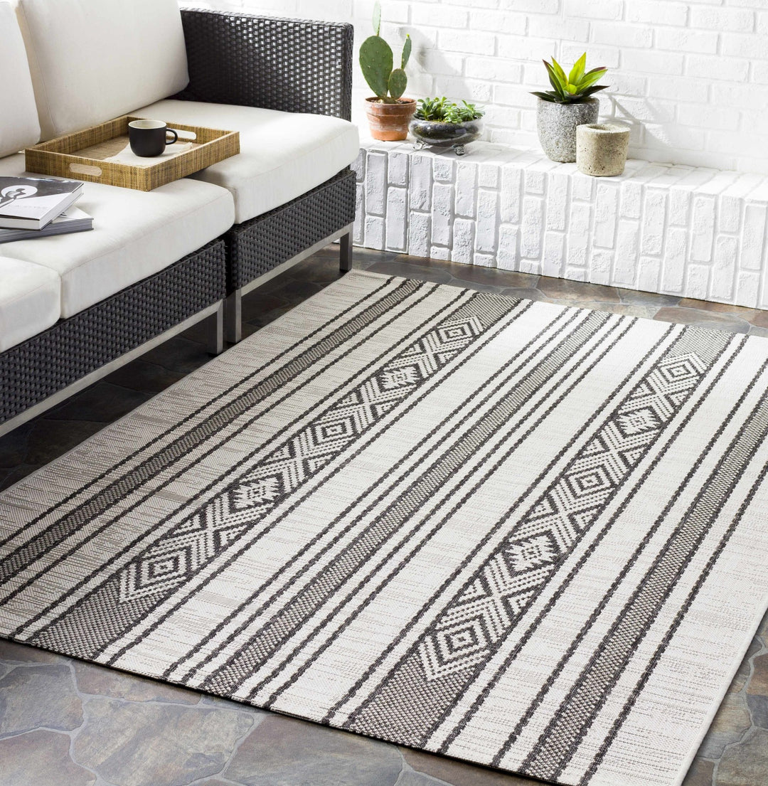 Cowen Modern Style Ivory And Charcoal Outdoor Area Rug - The Rug Decor