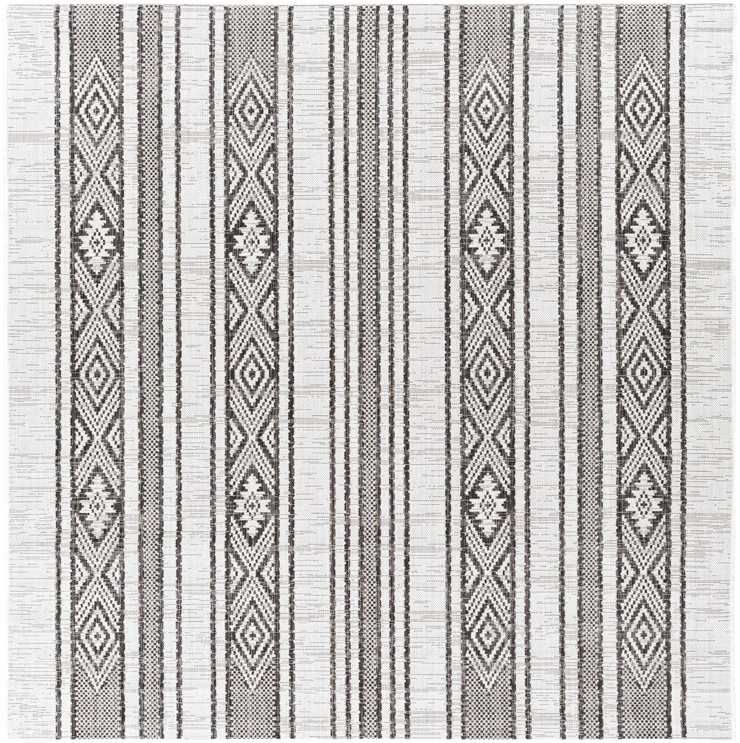 Cowen Modern Style Ivory And Charcoal Outdoor Area Rug - The Rug Decor
