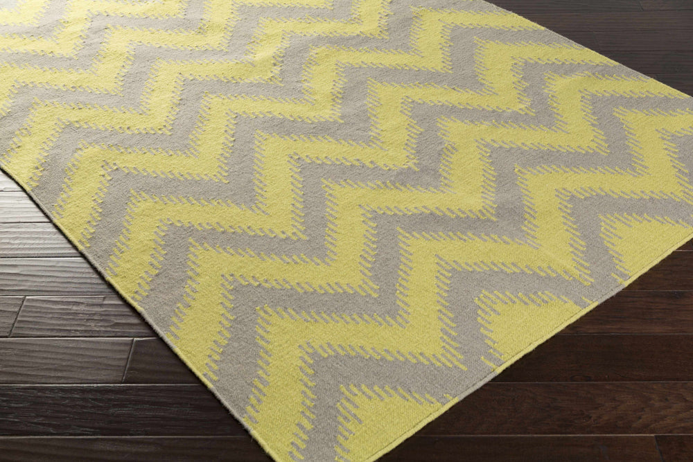 Yellow and gray chevron area rug, hand-woven with textured zigzag pattern