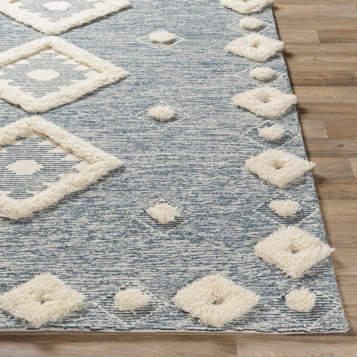 Curllsville Traditional Blue And Ivory Hand Tufted Wool Area Rug - The Rug Decor