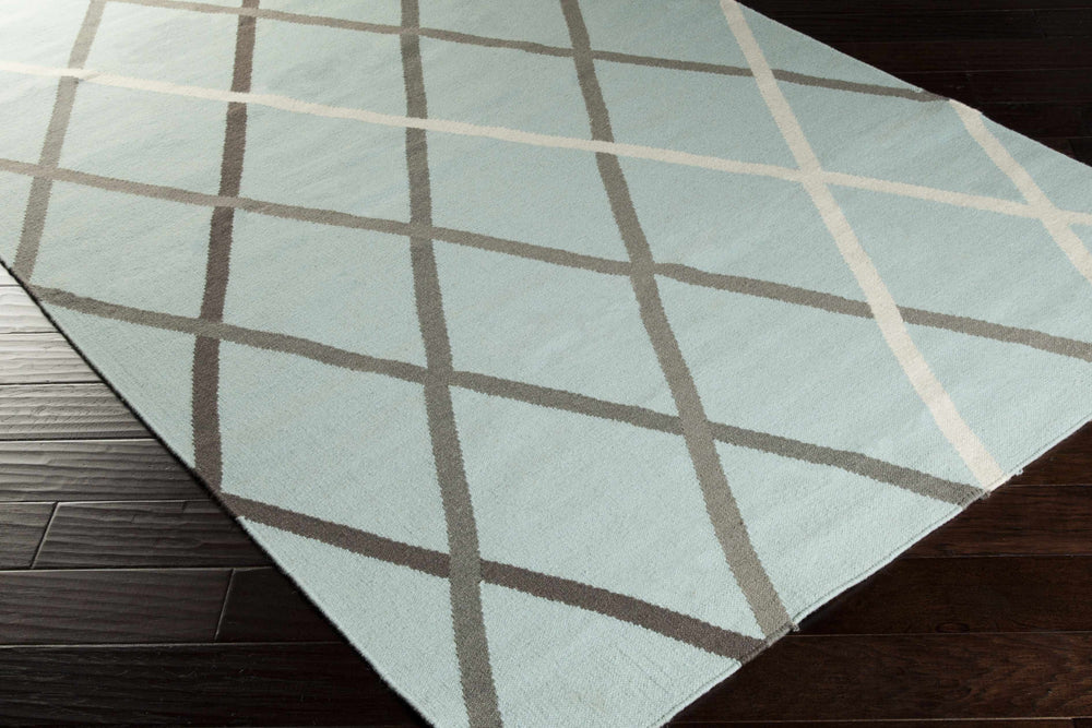 Light blue-gray area rug with taupe intersecting line lattice
