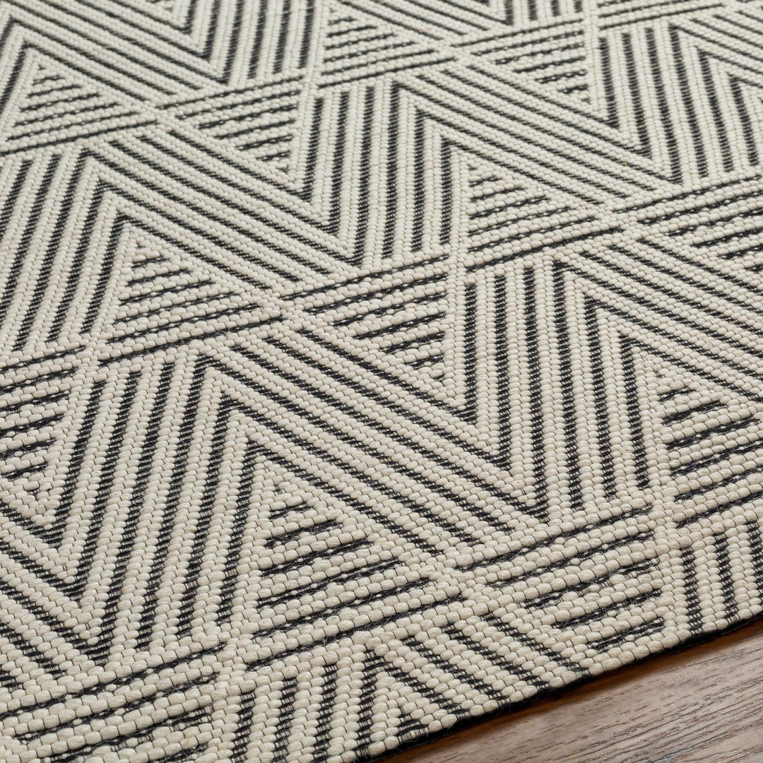 Dawid Modern chevron Ivory And Black Wool Area Rug - The Rug Decor