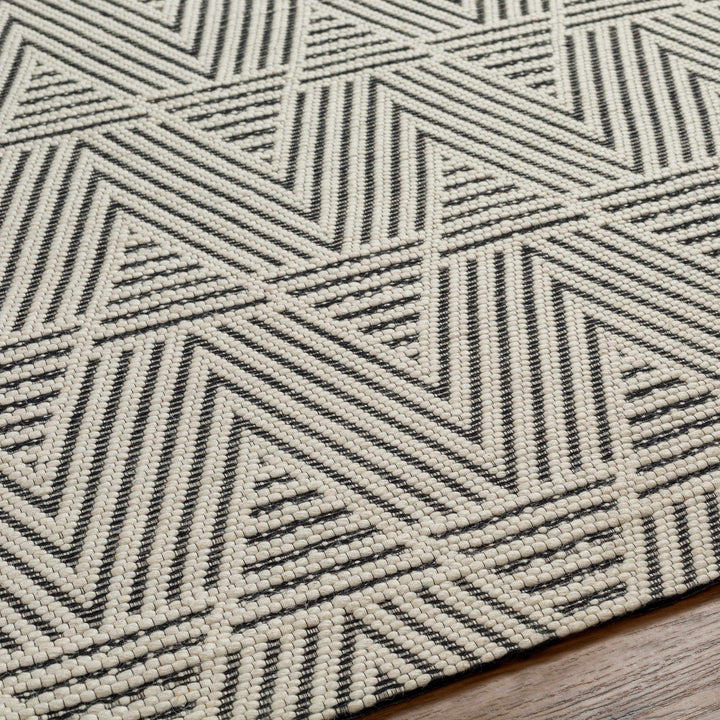 Dawid Modern chevron Ivory And Black Wool Area Rug - The Rug Decor