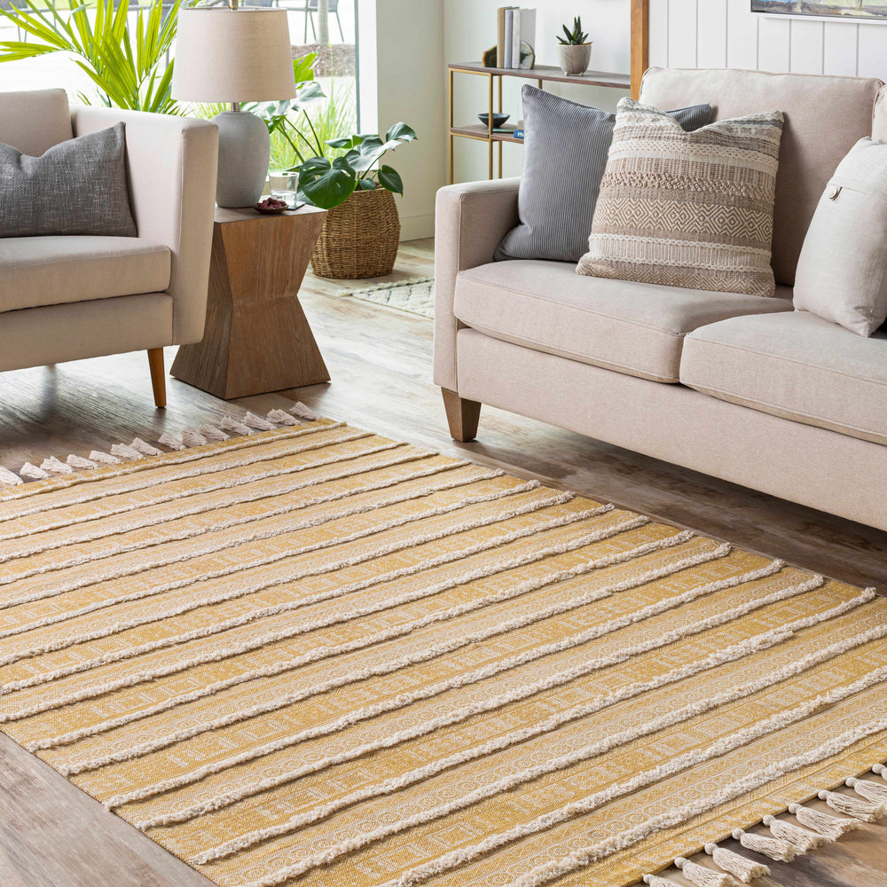Rectangle area rug in beige and yellow with geometric stripe pattern and fringe