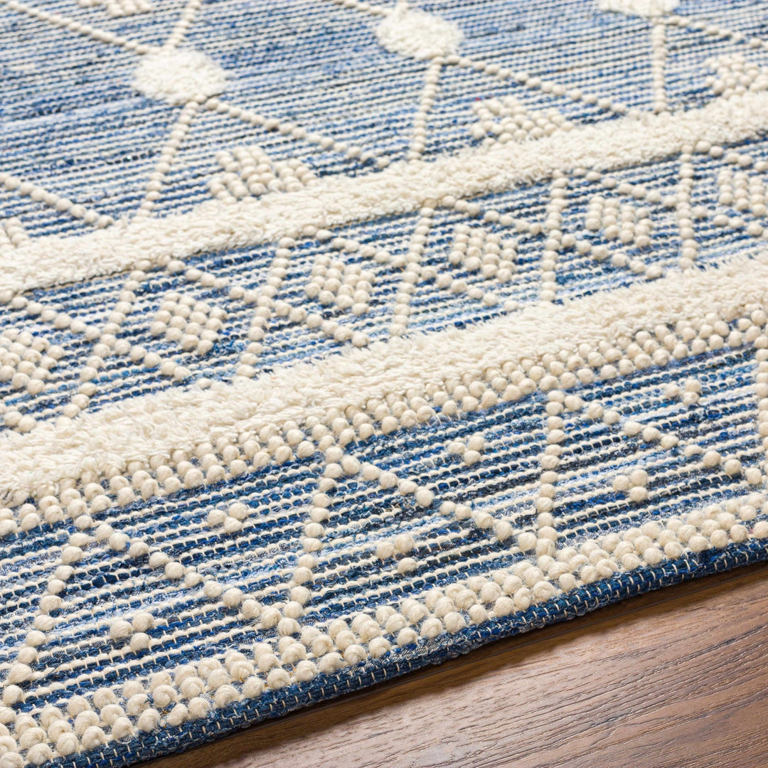 Eben Bohemian Style Ivory And Blue Hand Woven Wool Rug - The Rug Decor