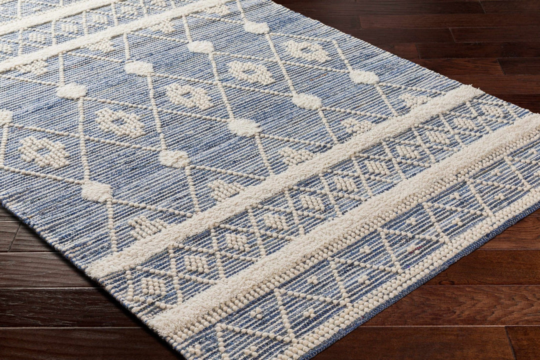Eben Bohemian Style Ivory And Blue Hand Woven Wool Rug - The Rug Decor