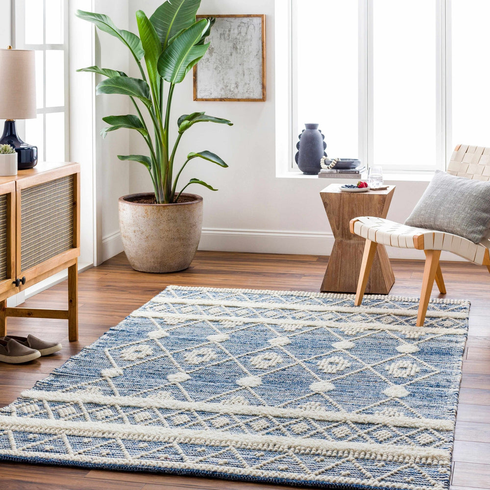 Eben Bohemian Style Ivory And Blue Hand Woven Wool Rug - The Rug Decor