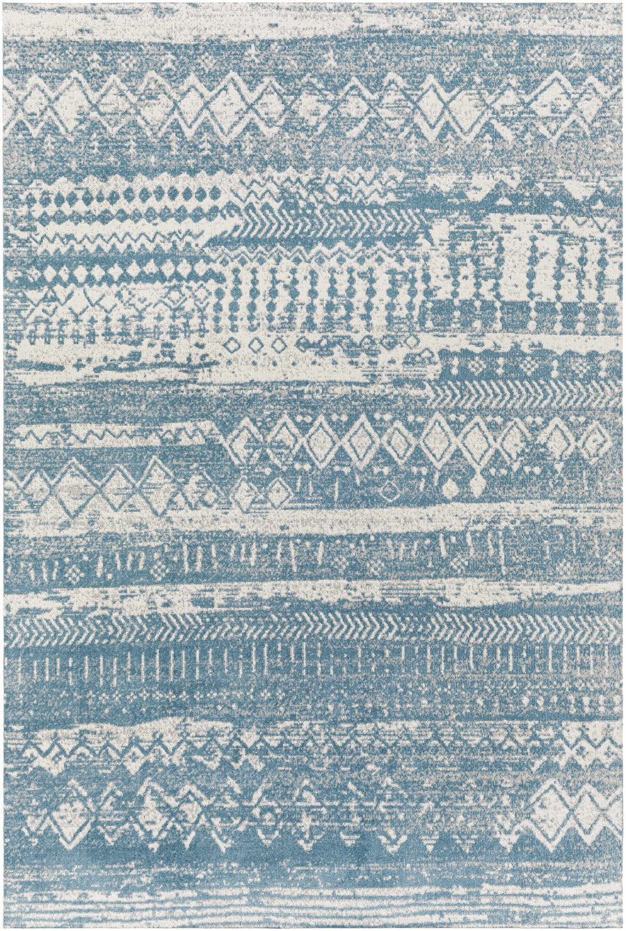Blue and ivory geometric area rug with layered diamond and zigzag pattern.