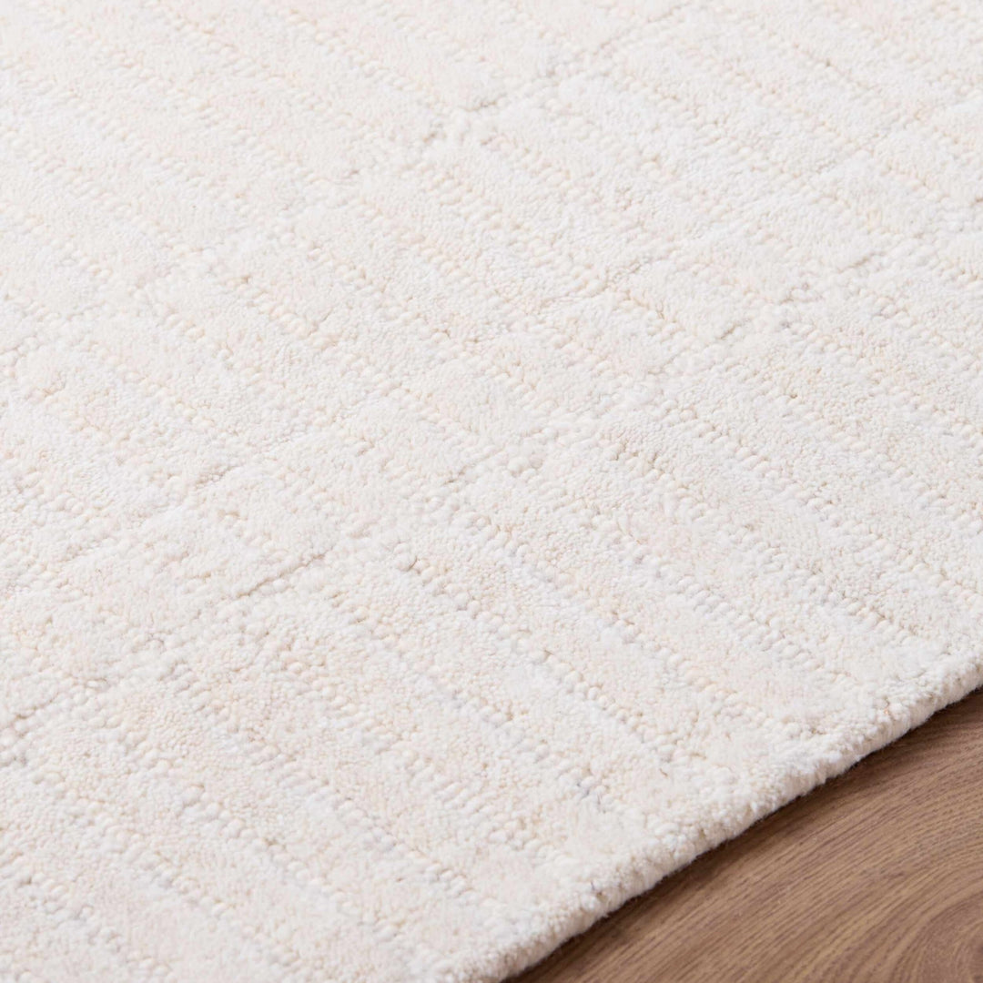 Finial Modern Solid Design Ivory Hand Tufted Wool Area Rug - The Rug Decor
