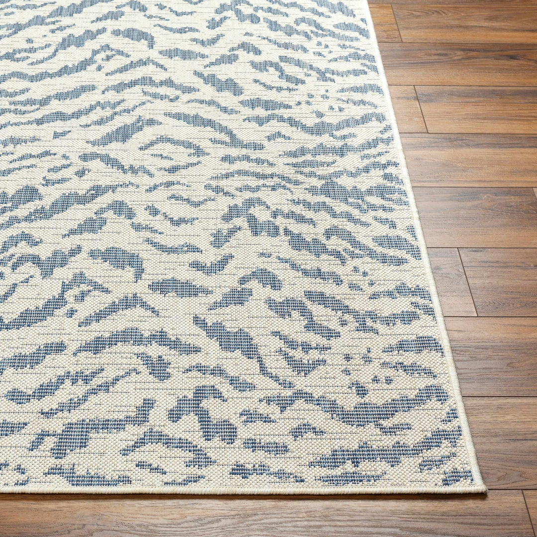Friso Contemporary Abstract Blue And Ivory Area Rug - The Rug Decor