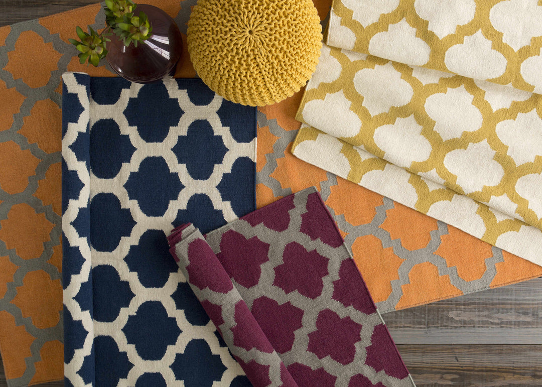 Grinnell Orange Contemporary Geometrical Hand Woven Area Rug