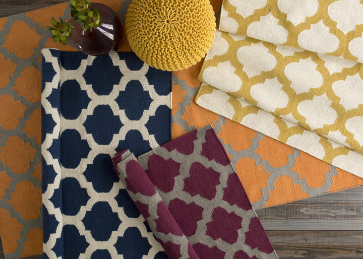 Grinnell Orange Contemporary Geometrical Hand Woven Area Rug