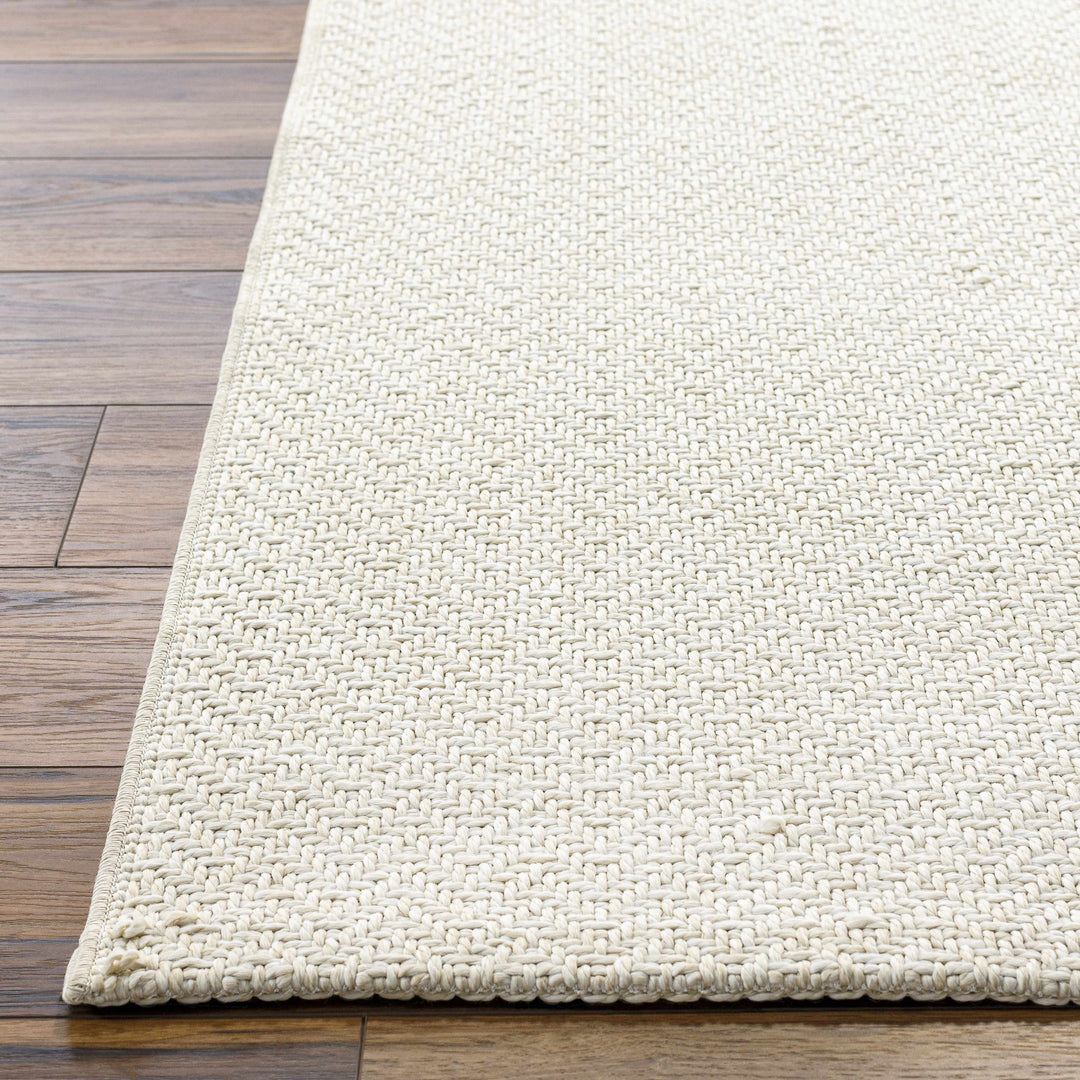 Ozzie Modern Solid Ivory Machine Woven Rug