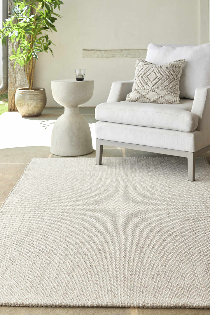 Ozzie Modern Solid Ivory Machine Woven Rug