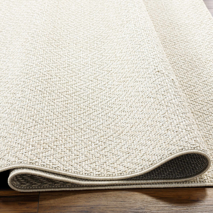 Ozzie Modern Solid Ivory Machine Woven Rug