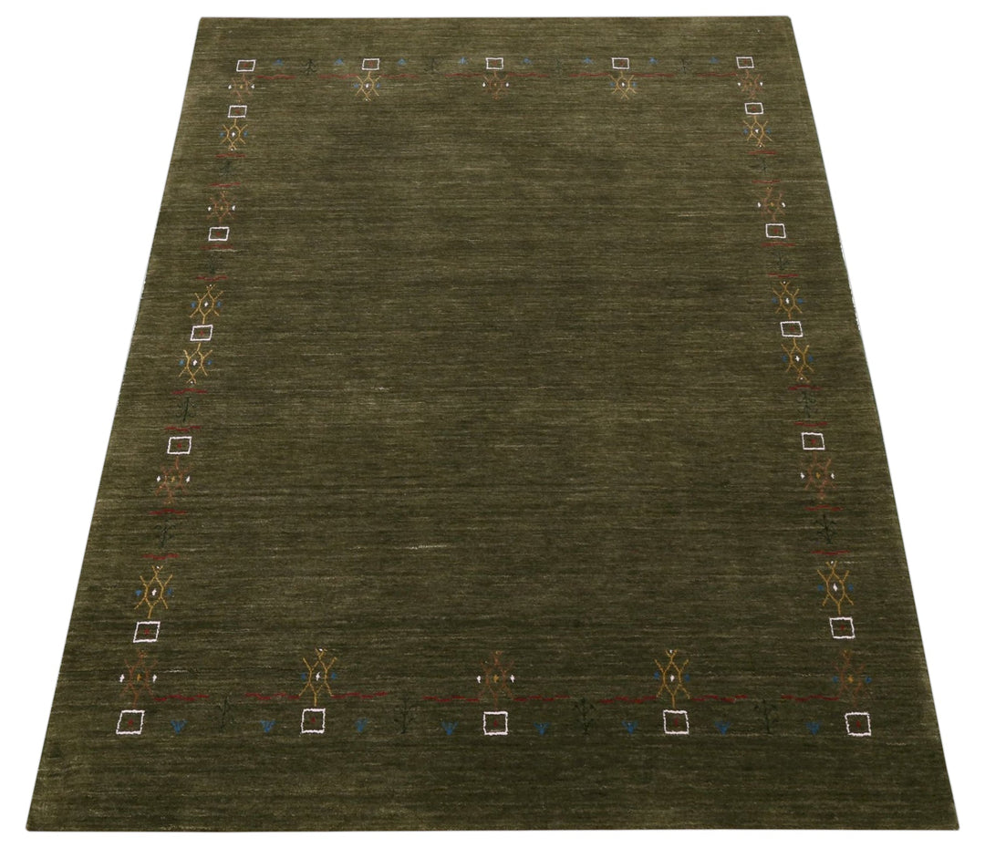 Green Tribal Border Design Hand Loomed Wool Area Rug - The Rug Decor