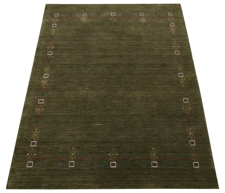 Green Tribal Border Design Hand Loomed Wool Area Rug - The Rug Decor