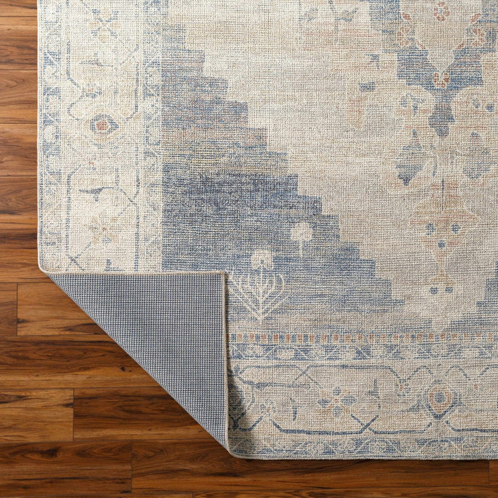 Gyan Traditional Blue And Ivory Machine Woven Area Rug - The Rug Decor