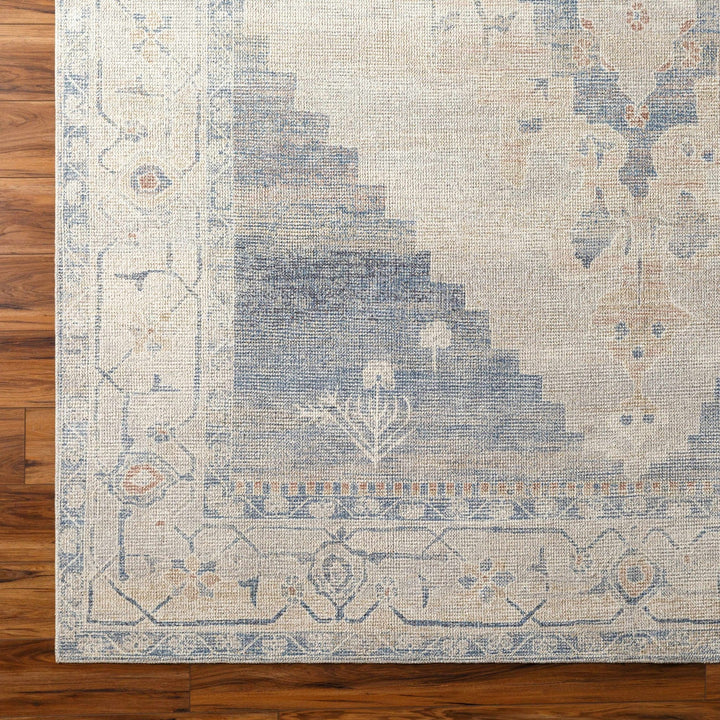 Gyan Traditional Blue And Ivory Machine Woven Area Rug - The Rug Decor
