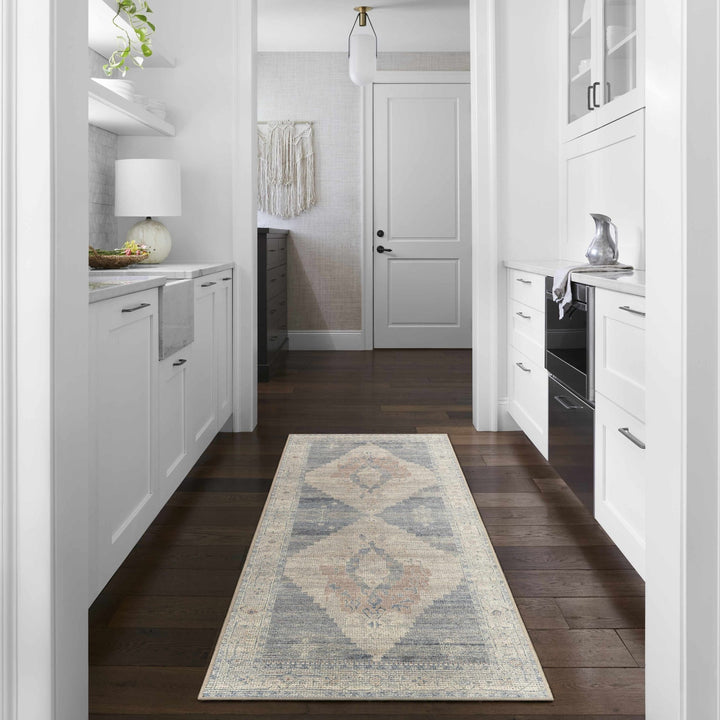 Gyan Traditional Blue And Ivory Machine Woven Area Rug - The Rug Decor