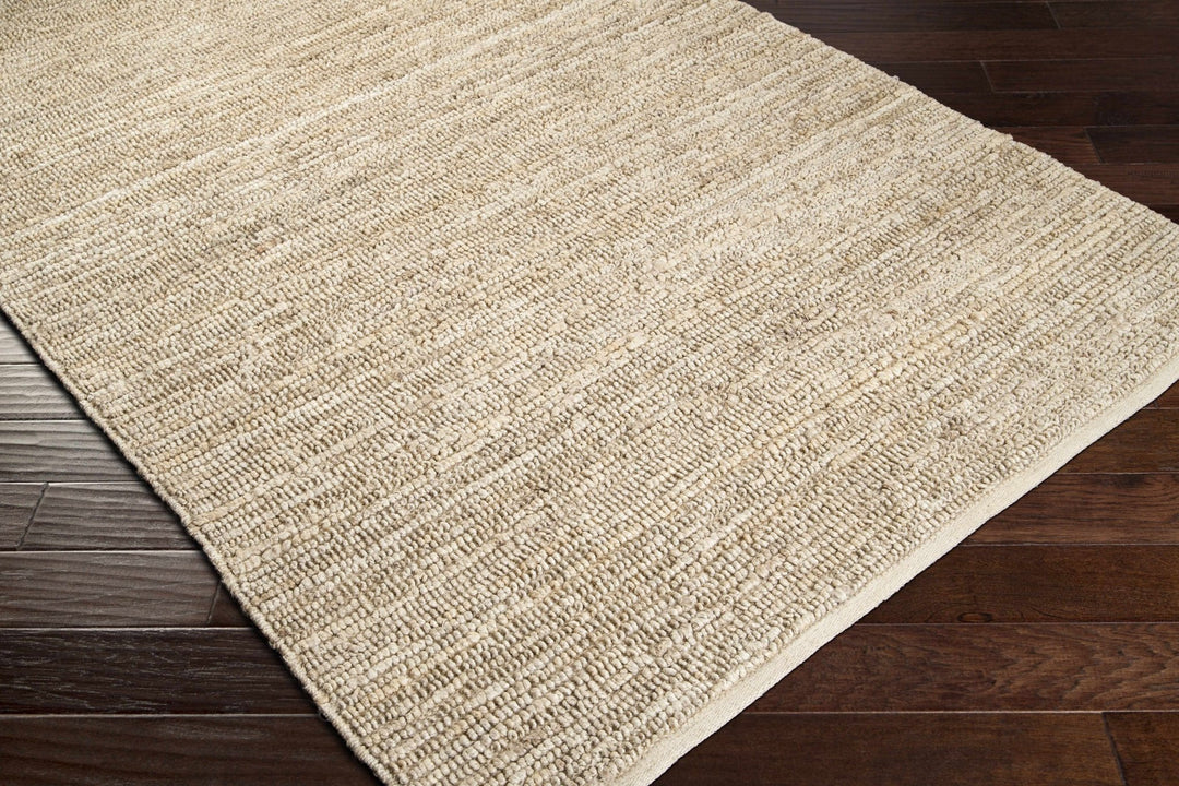 Hand Woven Ivory Modern Style Braided Jute Carpet - The Rug Decor