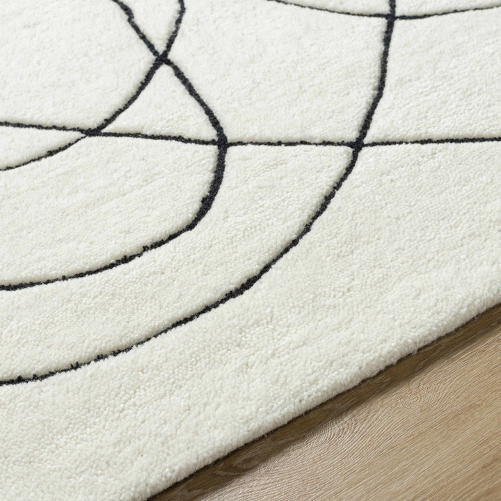 Harta Ivory And Black Contemporary Hand Tufted Wool Area Rug - The Rug Decor