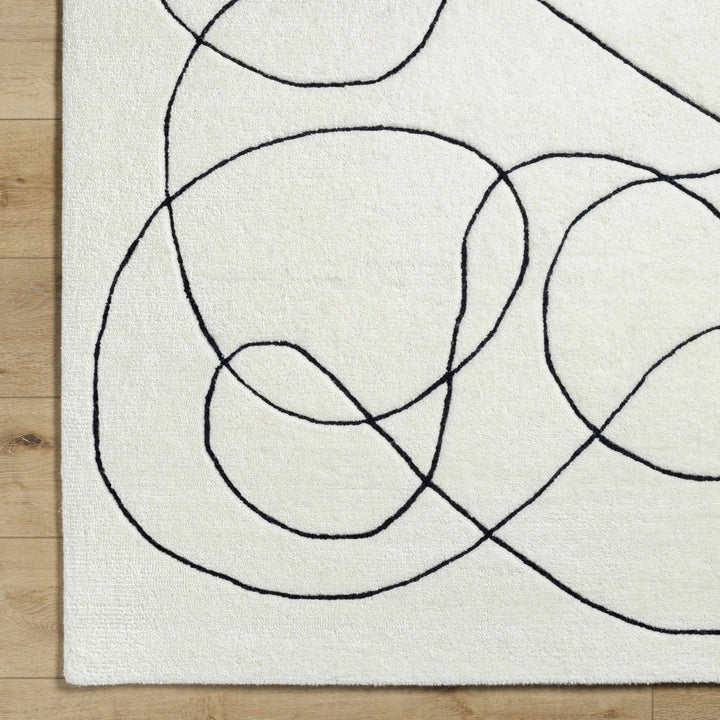 Harta Ivory And Black Contemporary Hand Tufted Wool Area Rug - The Rug Decor