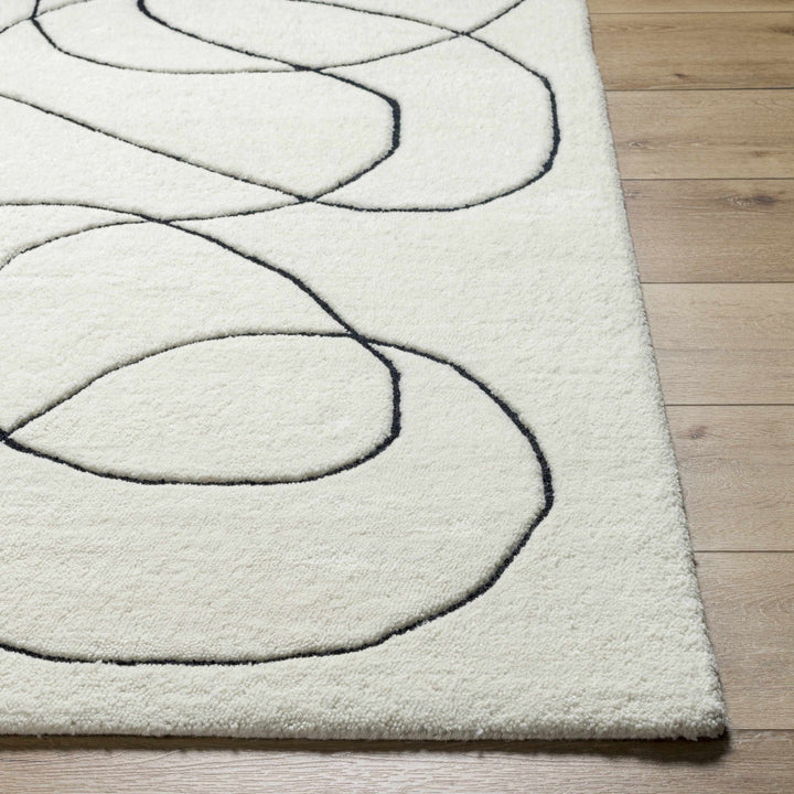 Harta Ivory And Black Contemporary Hand Tufted Wool Area Rug - The Rug Decor