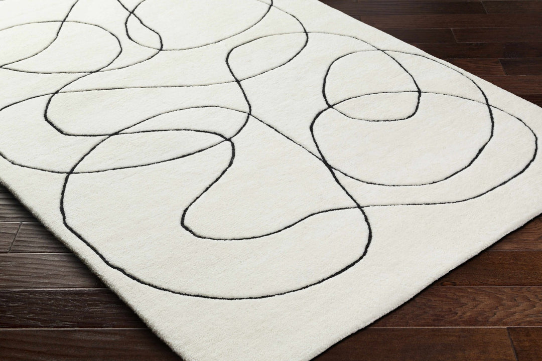 Harta Ivory And Black Contemporary Hand Tufted Wool Area Rug - The Rug Decor