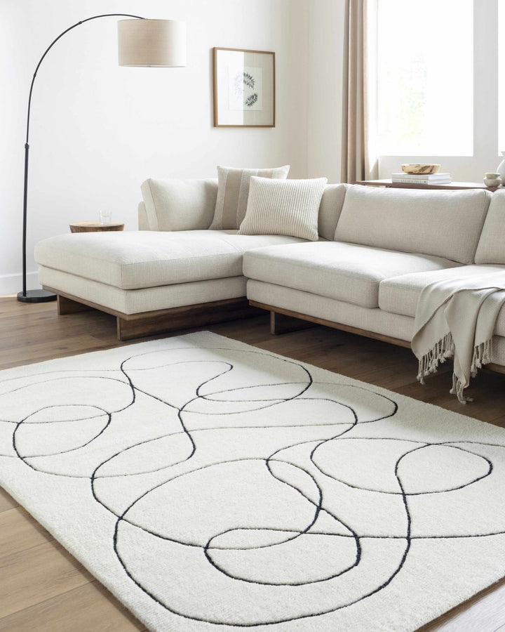 Harta Ivory And Black Contemporary Hand Tufted Wool Area Rug - The Rug Decor