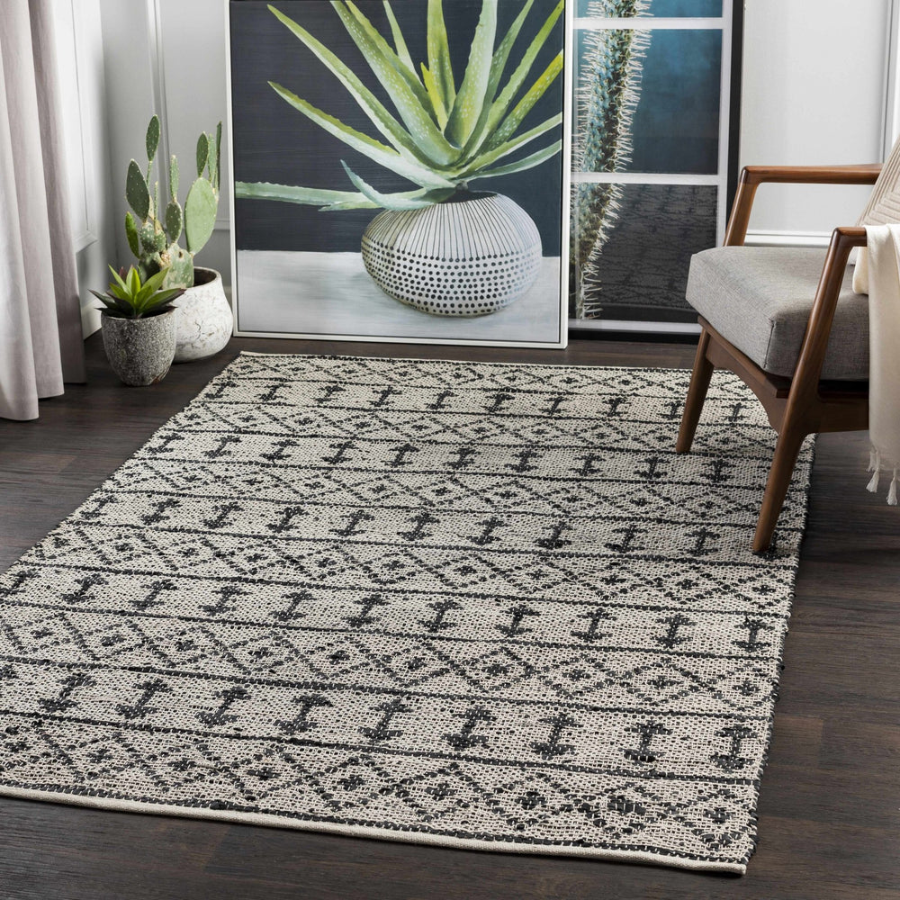 Hector Modern Geometrical Design Black And Ivory Hand Woven Area Rug - The Rug Decor