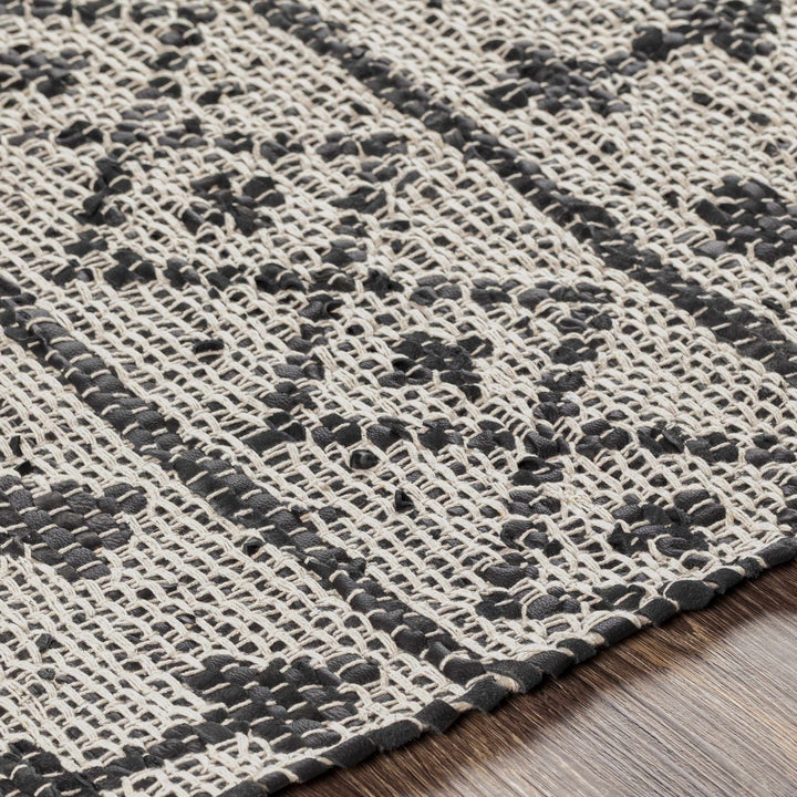 Hector Modern Geometrical Design Black And Ivory Hand Woven Area Rug - The Rug Decor