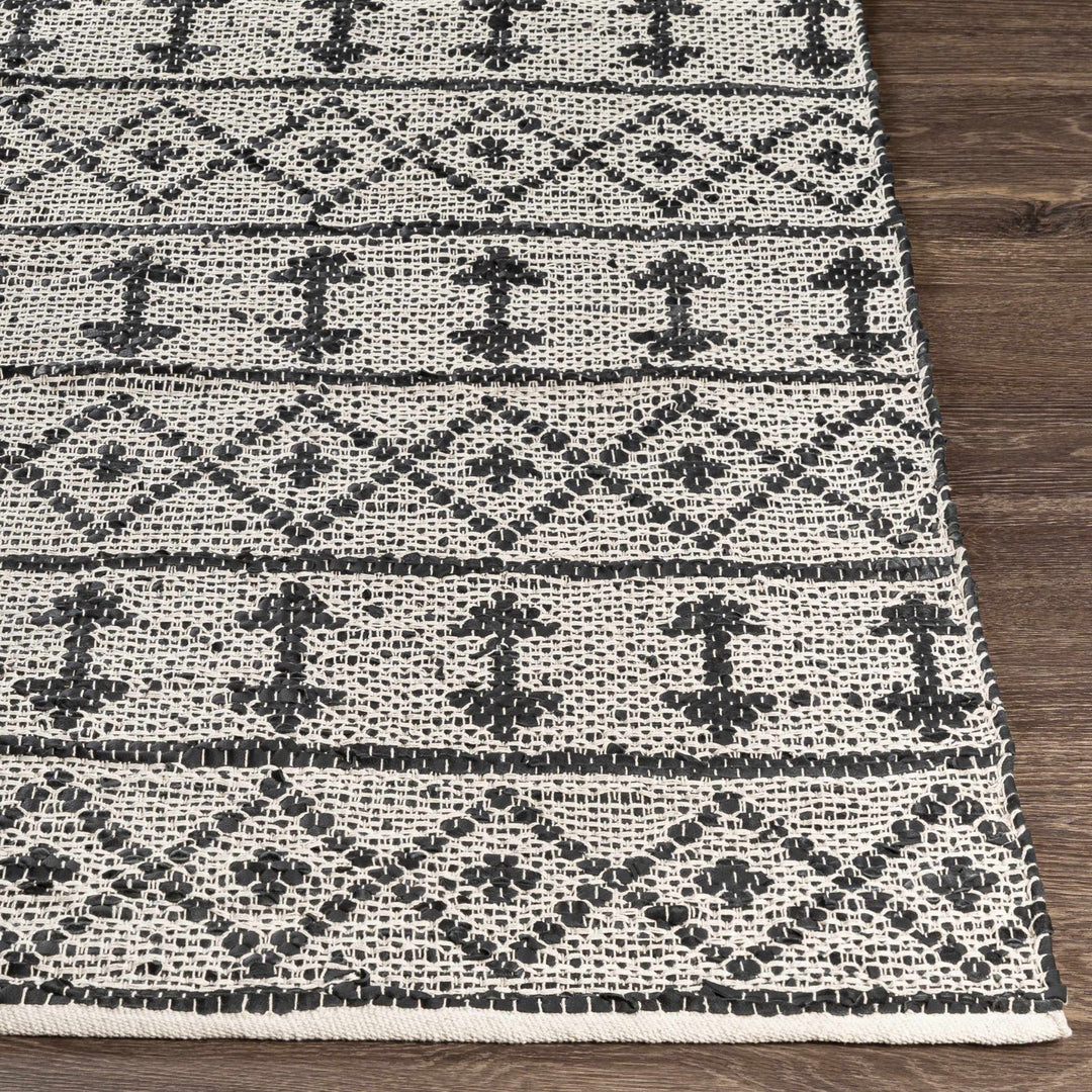Hector Modern Geometrical Design Black And Ivory Hand Woven Area Rug - The Rug Decor