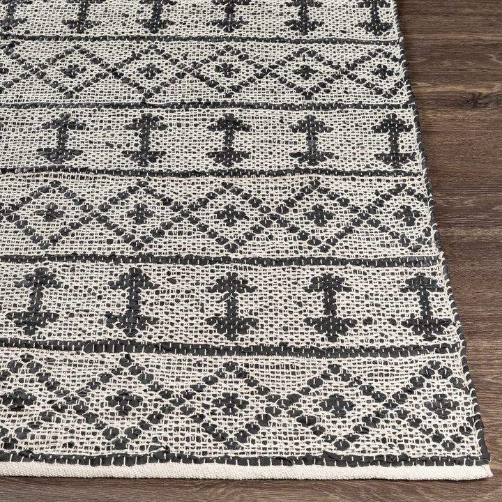 Hector Modern Geometrical Design Black And Ivory Hand Woven Area Rug - The Rug Decor