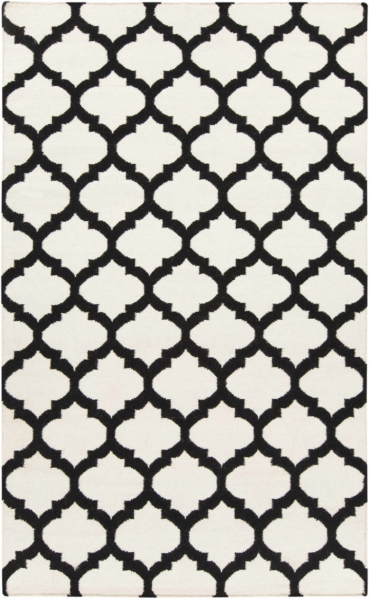 Hand-woven area rug with ivory and black geometric trellis pattern, flat weave