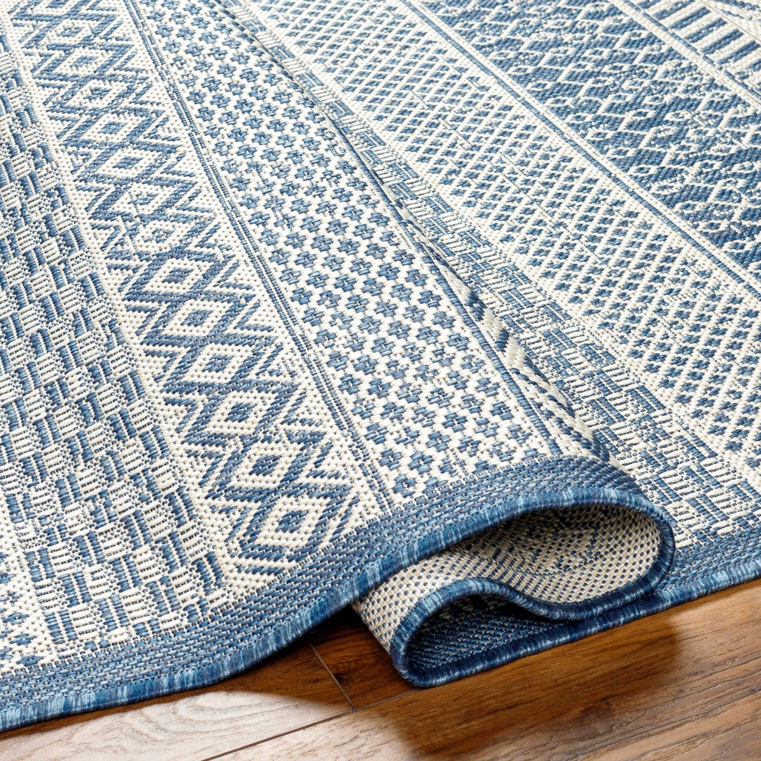 Humla Bohemian Blue And Ivory Area Rug - The Rug Decor