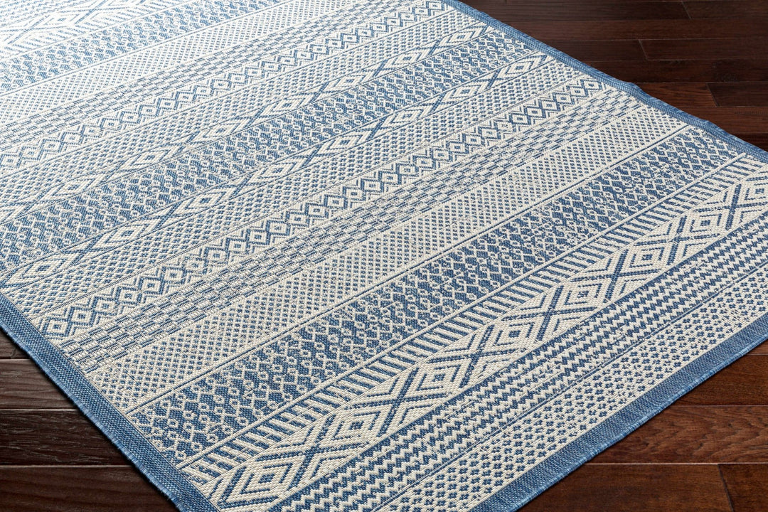 Humla Bohemian Blue And Ivory Area Rug - The Rug Decor