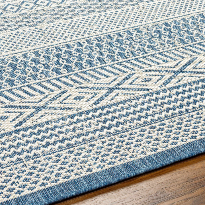 Humla Bohemian Blue And Ivory Area Rug - The Rug Decor