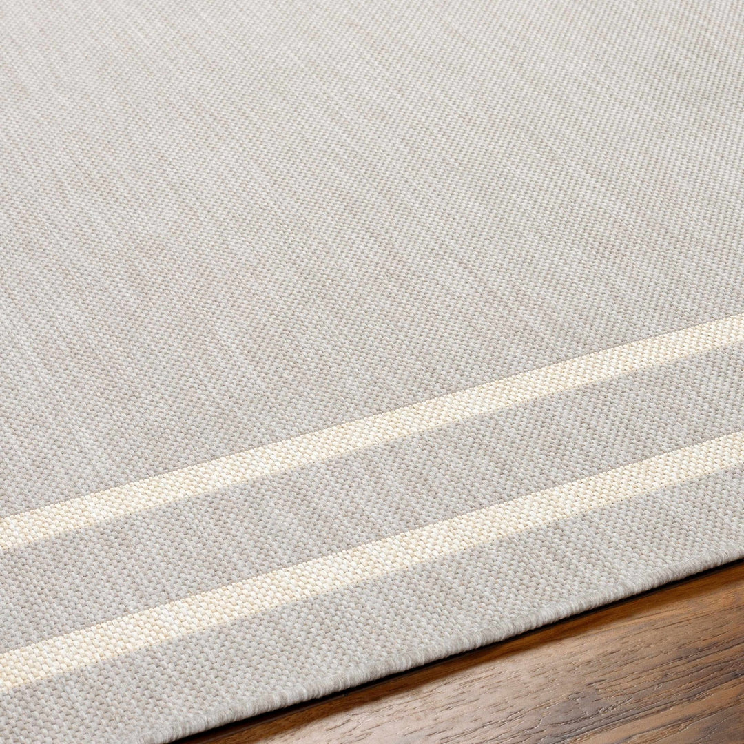 Ilori Modern Solid Gray And Ivory Area Rug - The Rug Decor